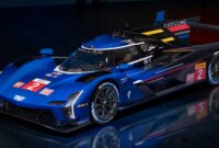 Cadillac V-LMDh Race Car Debuts In Blue, Red, and Gold Color Scheme