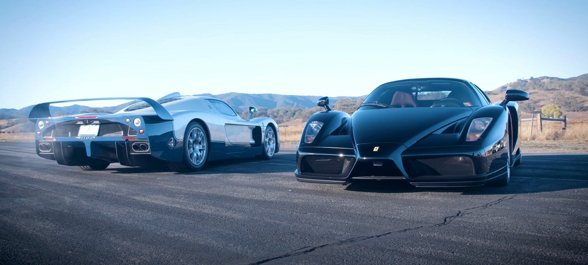 Clear your mind of so many electric cars, and enjoy the battle between a Ferrari Enzo and a Maserati MC12