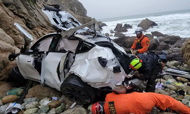 Doctor accused of intentionally throwing a Tesla with his wife and children inside off a cliff