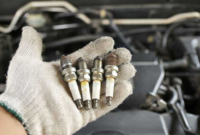 How do I know if my car needs a spark plug change?