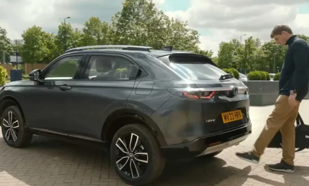 Max Verstappen drives a Honda HR-V in the middle of a field in a new commercial