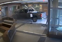 Video shows how a man crashed a pickup truck into a Colorado police station