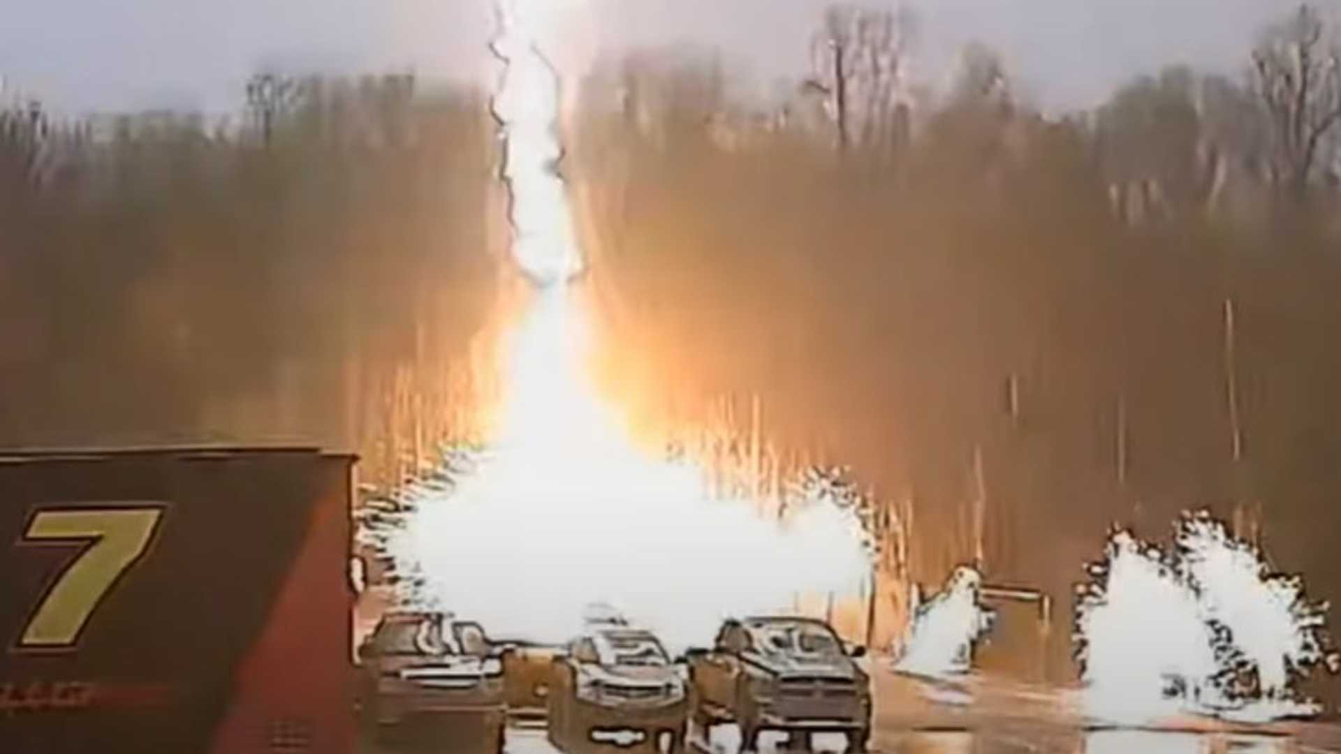 Watch Lightning Make A Shower Of Sparks In A NASCAR Team Parking Lot