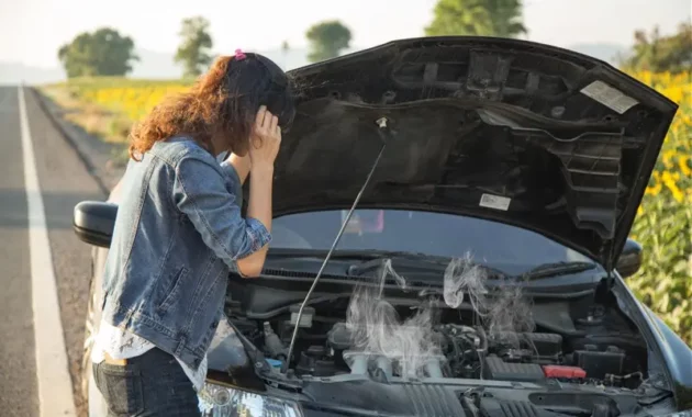 Why does my car get hot when I turn on the air conditioner?