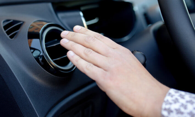 Why does my car's air conditioning only cool when I accelerate?