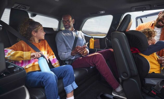 The 2024 Toyota Grand Highlander teaser offers a peek inside the three-row SUV