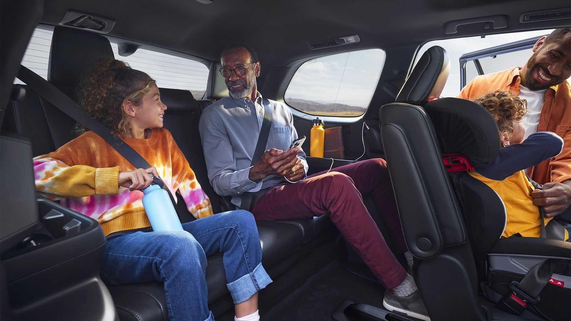 The 2024 Toyota Grand Highlander teaser offers a peek inside the three-row SUV